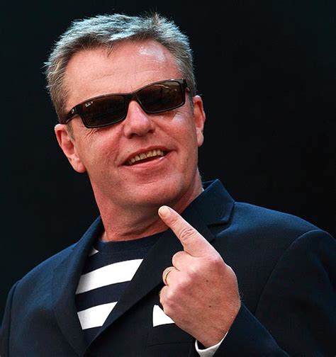 The Early Life of Graham McPherson (Suggs): From London Streets to Musical Stardom