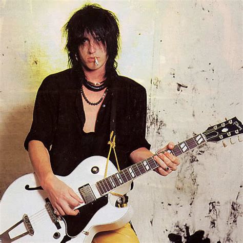 The Songwriting Prodigy: Exploring Izzy Stradlin's Indispensable Contributions to Guns N' Roses