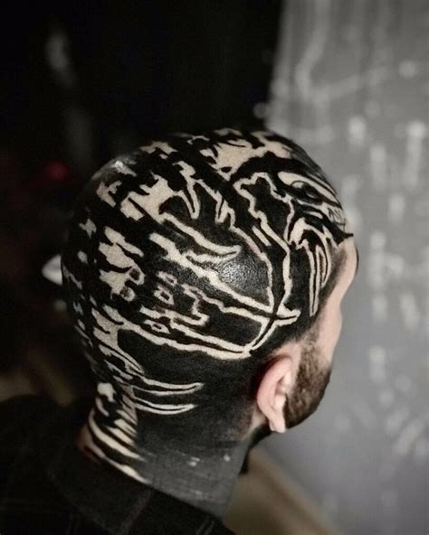 Unconventional Style: The Iconic Shaved Head and Tattooed Body